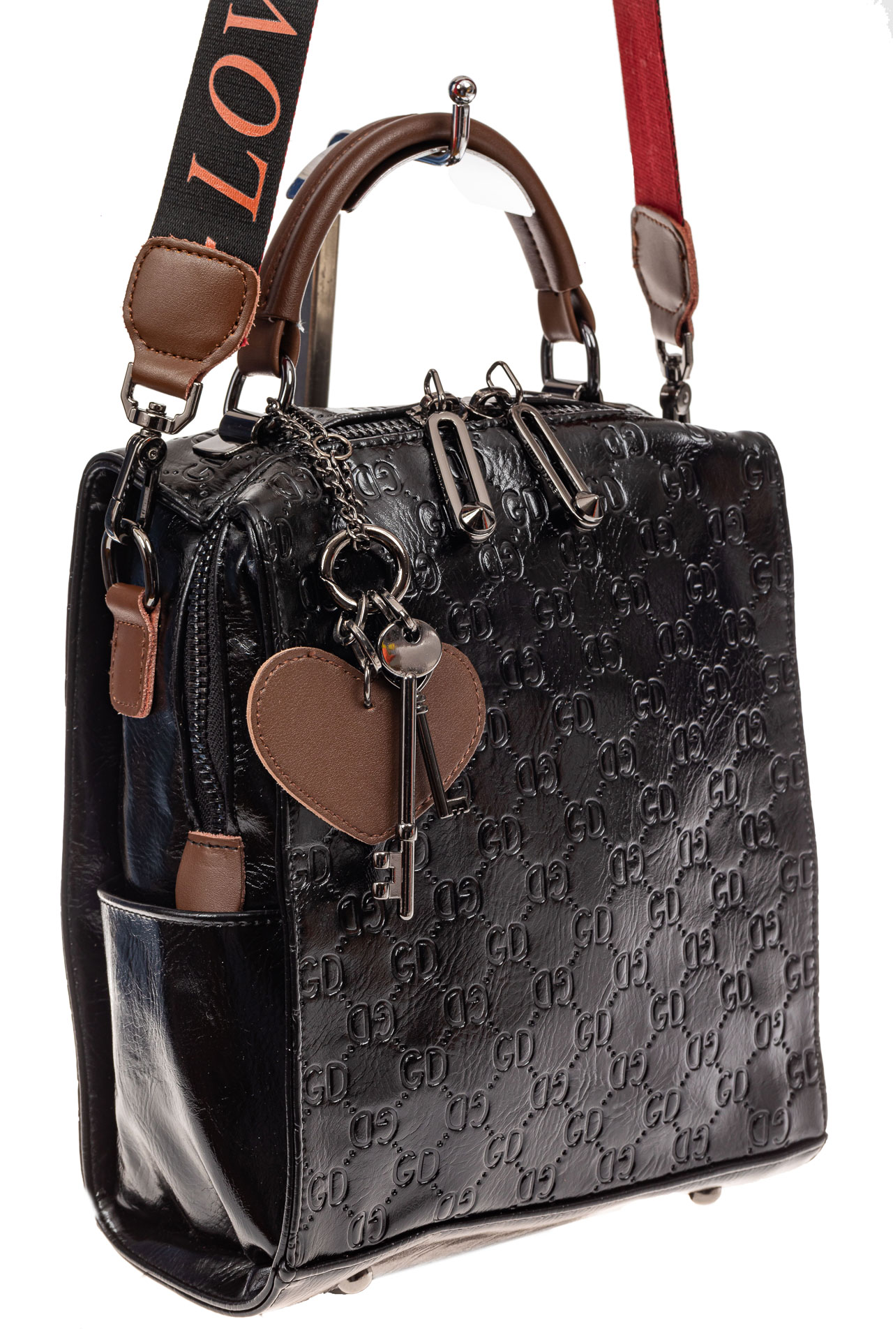 На фото 1 - Сумка женская рюкзак из искусственной кожи с тиснением, цвет черный