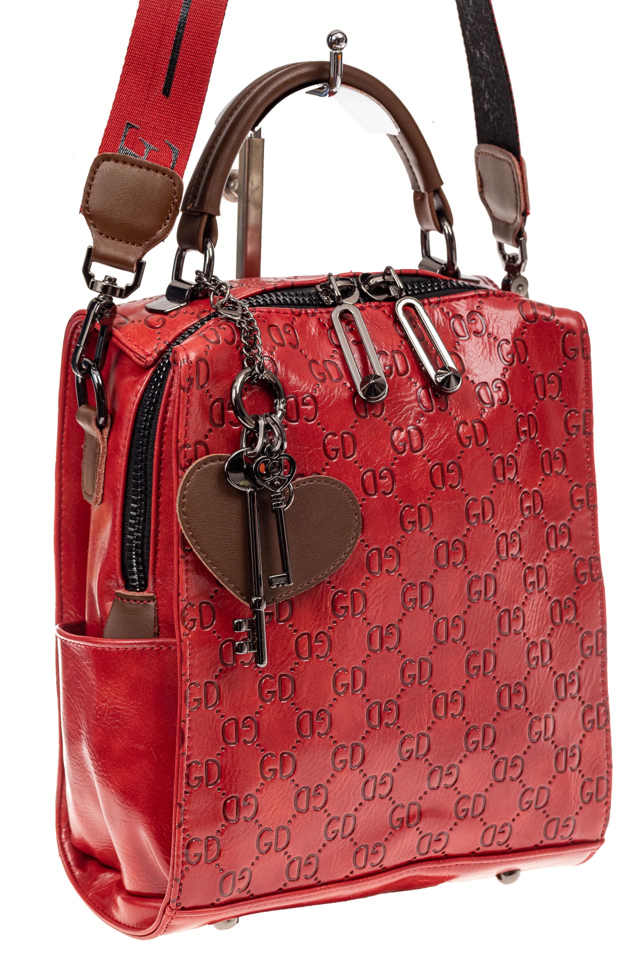 На фото 1 - Сумка женская рюкзак из искусственной кожи с тиснением, цвет красный