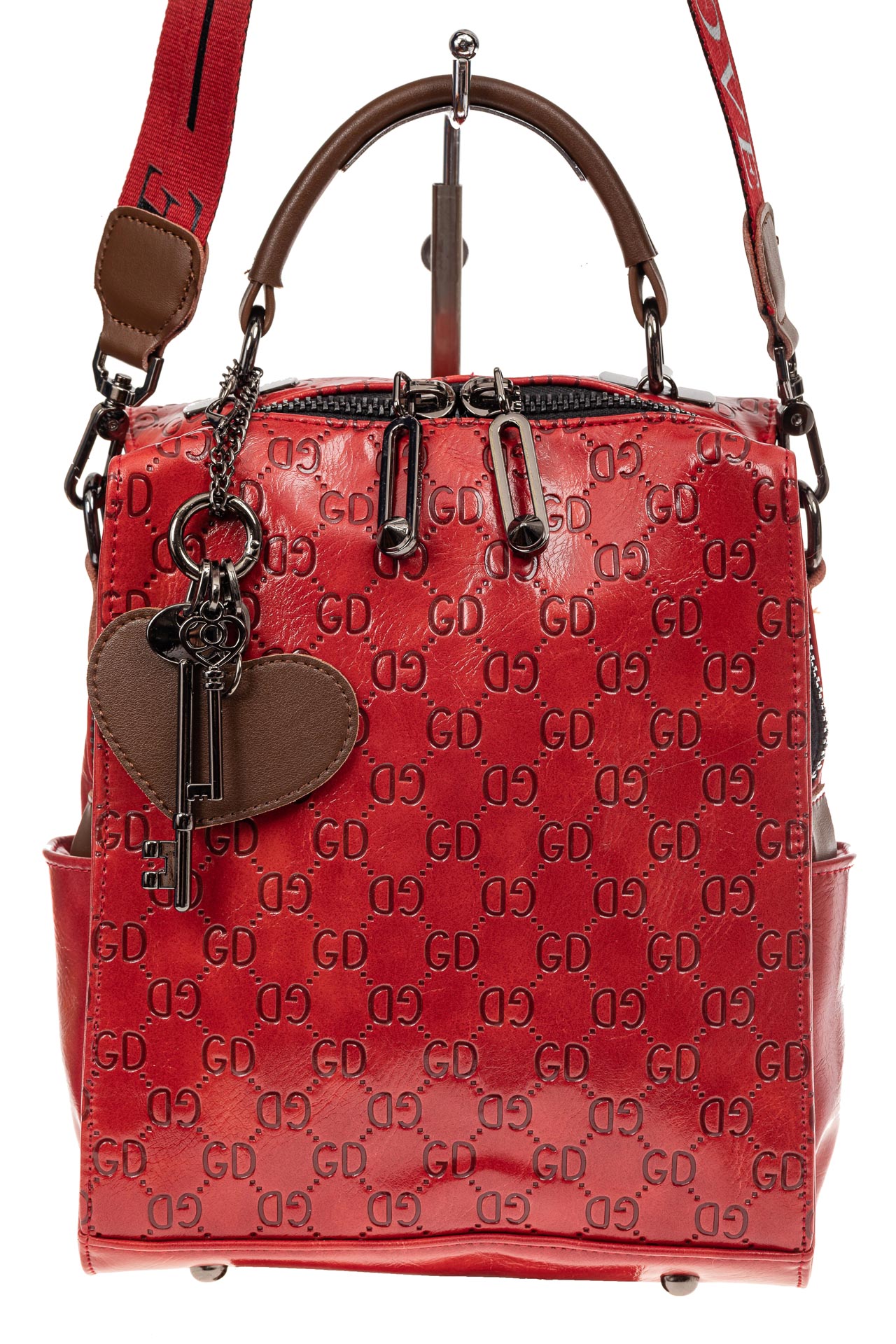 На фото 2 - Сумка женская рюкзак из искусственной кожи с тиснением, цвет красный