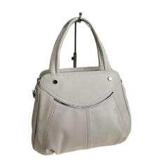 На фото 1 - Женская сумка из искусственной кожи, цвет молочный